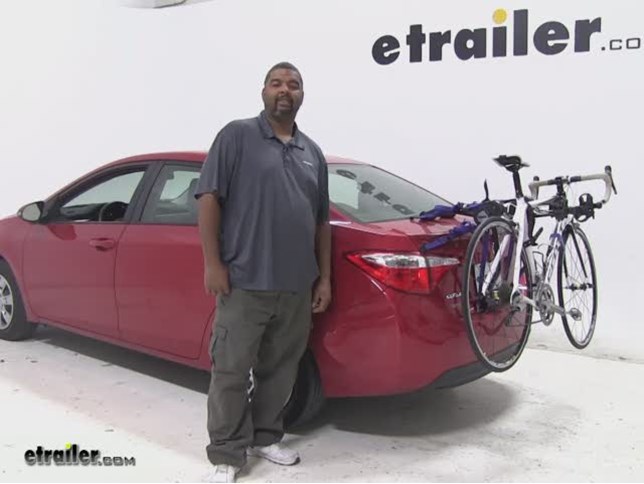 Thule Passage Trunk Bike Racks Review - 2014 Toyota Corolla Video |  etrailer.com