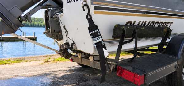Boat Doesn't Feel Secure? Boat on boat trailer secured with straps.